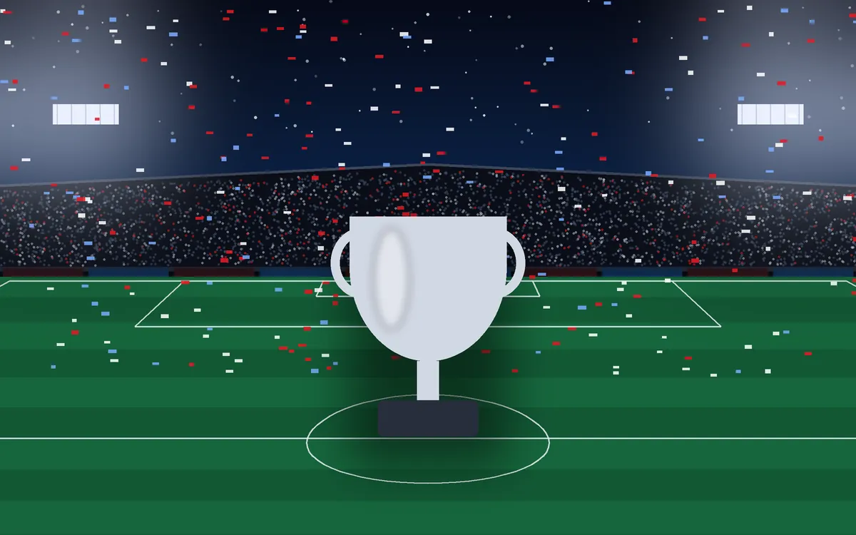 Stadium illustration at night with a generic silver trophy on the pitch and confetti in the air
