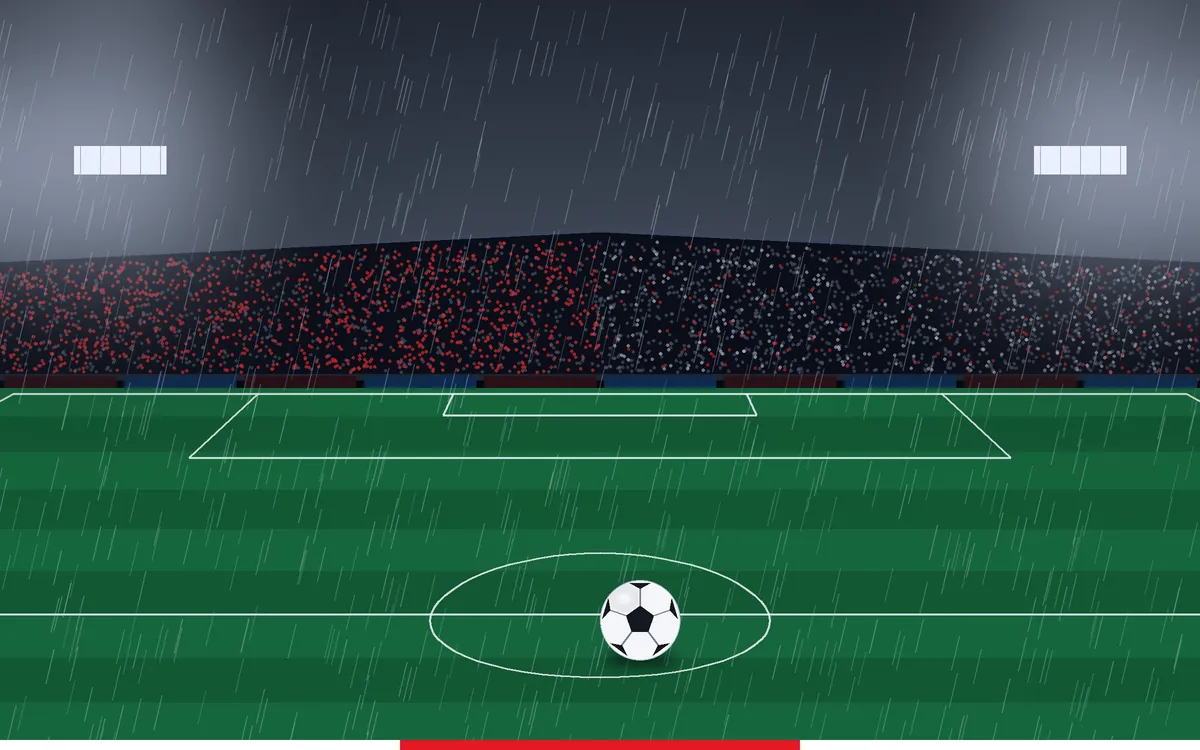 Rainy floodlit stadium with red and white fans